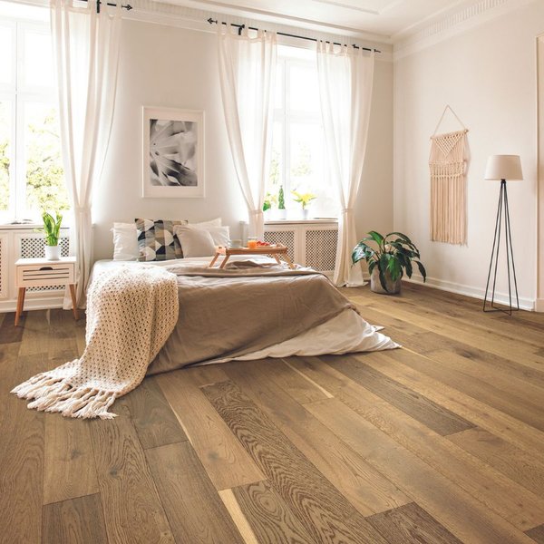 hardwood flooring in a bright bedroom