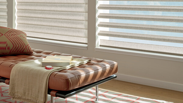 window treatments in sitting area blinds fabric shades in living area with leather chaise lounge